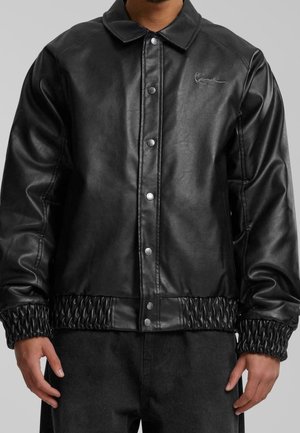 Imiteret læderjakke - black