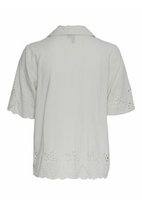 Balta medvilninė palaidinė su apykakle, trumpomis rankovėmis ir siuvinėtomis iškirptėmis kraštuose bei rankovių pakraščiuose.