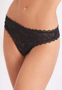 Aubade TANGA ROSESSENCE - Slip - black