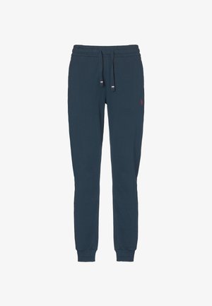 Pantaloni della tuta blu navy realizzati in misto cotone, con elastico in vita e cordoncino, e polsini a coste. Dettaglio del logo piccolo sulla gamba.