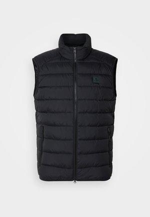 Sort fjervest med høj krave, lynlås foran og to sidelommer. Har syet quiltet mønster og et lille logo på brystet.