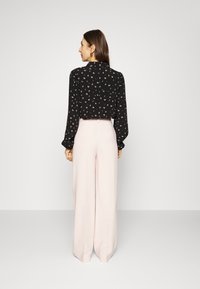 Modström GALE PANTS - Calças - bella rose
