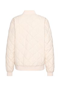 Gevoerde bomberjack in crème, met een gequilte structuur en geribde manchetten en zoom. Soepele, lichte stof met een ontspannen pasvorm.