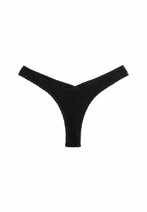 Svart stickad tanga med en V-formad framdel. Gjord av texturerat material, med tunna remmar och design med minimal täckning.