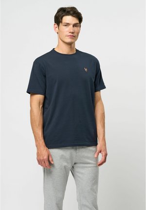 Navy blue short-sleeve t-shirt made of cotton, featuring a small multi-colored logo on the chest and a relaxed fit.