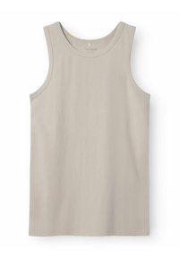 Débardeur beige clair en tissu doux, avec un col rond et des emmanchures larges. Design simple sans motifs ni accents.