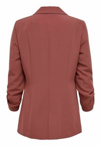 Blazer couleur rouille avec un col à revers cranté, des épaules structurées et une coupe ajustée. Dispose d'une unique fente au dos et d'une texture de tissu lisse.