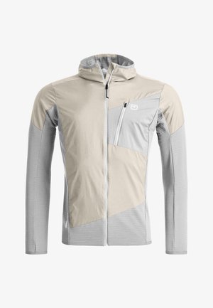 Beige and light gray full-zip hooded jacket with a zippered chest pocket and textured long sleeves, designed for outdoor activities.