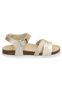 Sandalias de tiras con una plantilla de corcho, que presentan una parte superior metálica en color beige, dos tiras brillantes y una suela de goma blanca. Correa ajustable en el tobillo con hebilla.