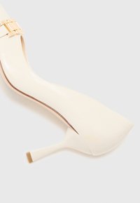 Högl Decolleté - creme