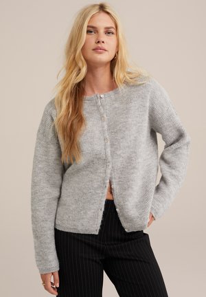 Gray, knitted cardigan with a round neckline, front button closure, and a slightly cropped, relaxed fit. Textured fabric with visible ribbing.