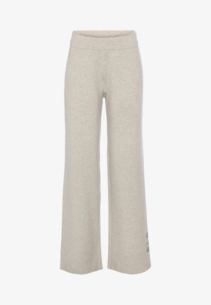 Helle graue, weit geschnittene Hose aus weichem, dehnbarem Stoff. Mit einem elastischen Bund und einem dezenten Logo-Detail am linken Bein.