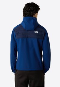 The North Face M MOUNTAIN ATHLETICS CARI HOODED JACKET - Winterjas - estate blue summit navy