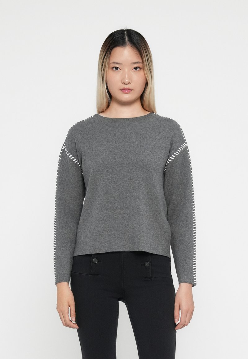 Gray sweater with long sleeves featuring white stitching along the shoulders. Soft texture, round neck, and a slightly cropped hem.