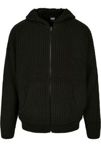 Svart ribbad stickad zip-up hoodie med framfickor och långa ärmar, utrustad med luva och ribbad nederkant.