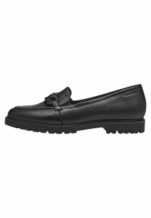 Mocassins en cuir noir avec un bout arrondi, des détails texturés à l'avant et une semelle en caoutchouc robuste dotée de petites rainures.