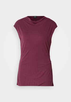 Haut bourgogne à manches courtes avec un décolleté drapé, texture douce et deux poches latérales discrètes, conçu pour un ajustement décontracté.