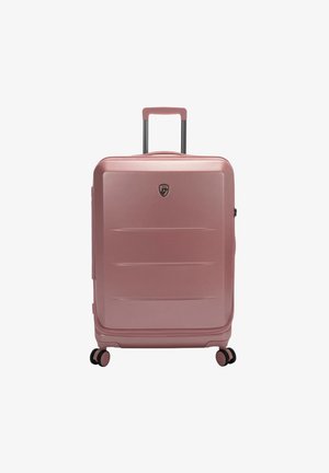 Rose-colored hard-shell suitcase with a smooth surface, horizontal grooves, retractable handle, and four multi-directional wheels.