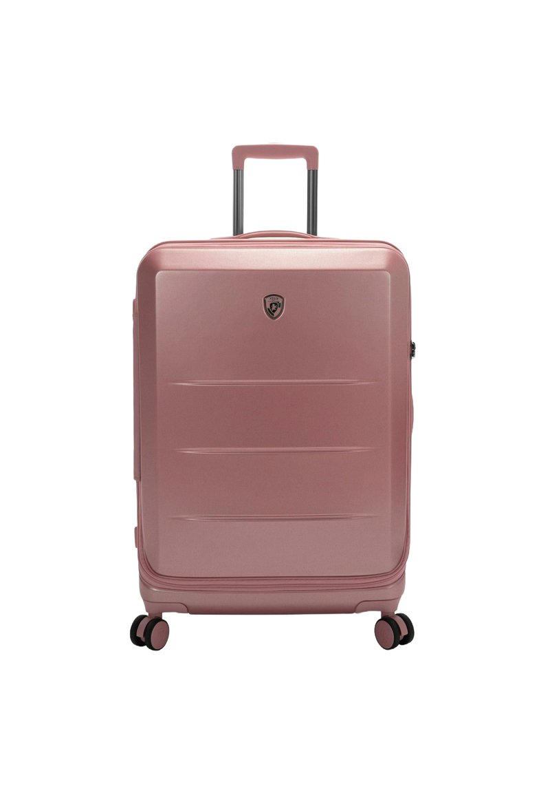 Rosa-farbener Hartschalenkoffer mit glatter Oberfläche, horizontalen Rillen, ausziehbarem Griff und vier multidirektionalen Rollen.