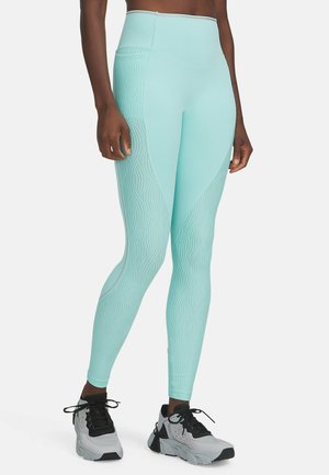 UA HALO JACQUARD  - Tights - neo turquoise
