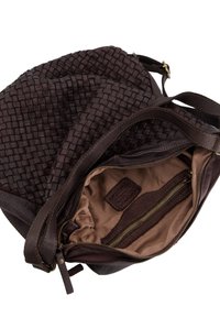 Brown woven leather handbag with a smooth texture, featuring a zippered interior pocket and a soft brown lining. Adjustable shoulder strap.