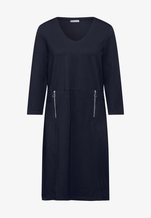 Navyblauwe jurk van zachte stof met een V-hals, driekwart mouwen en twee voorzakken met rits. Rechte snit.