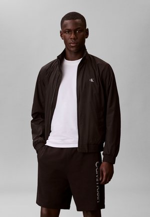 GRAPHIC  - Pantalones deportivos - black