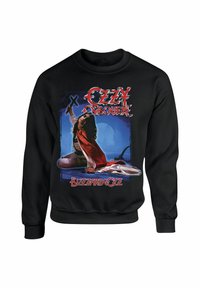 Sort sweatshirt med et frontmotiv af en figur med brunt hår, rød kappe og våben, med teksten "Ozzy Osbourne" og "Blizzard of Ozz".