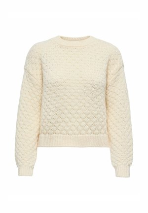 Suéter de punto color crema con patrón texturizado, mangas largas, puños y dobladillo de canalé, y un cuello redondo.