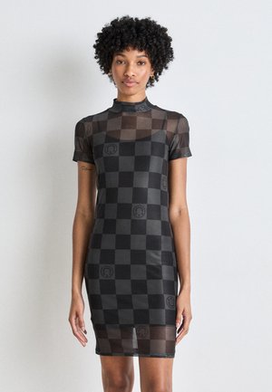 Black sheer dress featuring a checkerboard pattern with repeated smiley face logos. High collar, short sleeves, fitted silhouette.