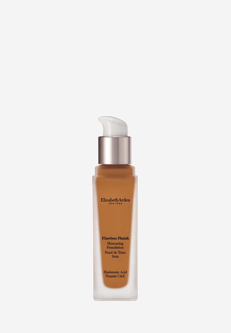 Flacon-pompe de fond de teint soin Elizabeth Arden Flawless Finish avec acide hyaluronique et vitamines C et E.