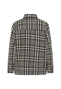 Veste en laine à carreaux noir et blanc avec manches longues et col, vue de dos sur fond blanc.