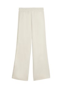 Pantalon ample couleur crème avec taille élastique et poches latérales, présenté sur un fond blanc.