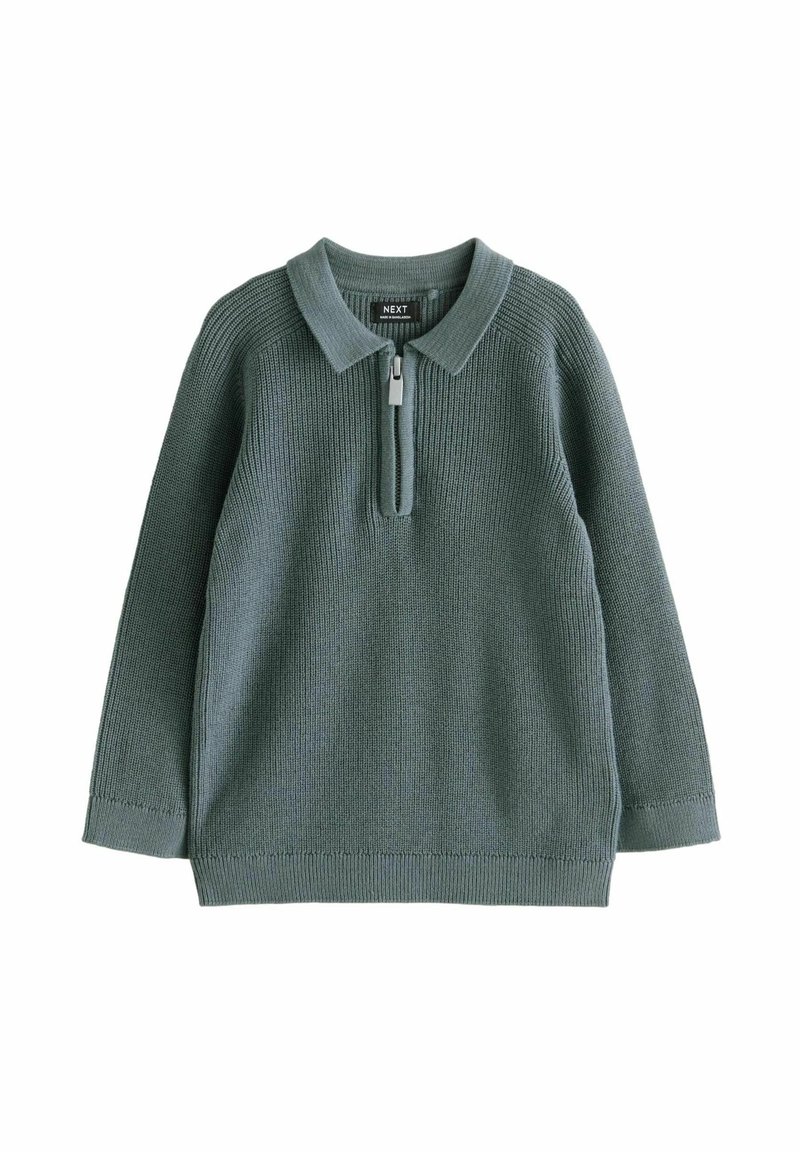 Lys grøn strikket sweater med halv-zip krave og lange ærmer. Har ribbet struktur ved kraven og manchetterne. Mærket synligt indeni.