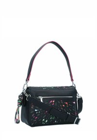 Sac à main en cuir noir avec un motif floral découpé, accents de sangles roses, quincaillerie argentée, poche frontale zippée et bandoulière amovible.