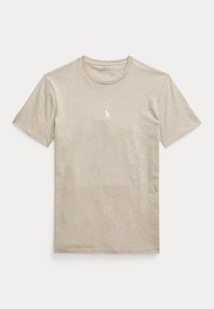 T-shirt in cotone beige con scollatura rotonda e maniche corte, con un piccolo logo bianco del polo sul petto. Tessuto liscio, vestibilità regolare.