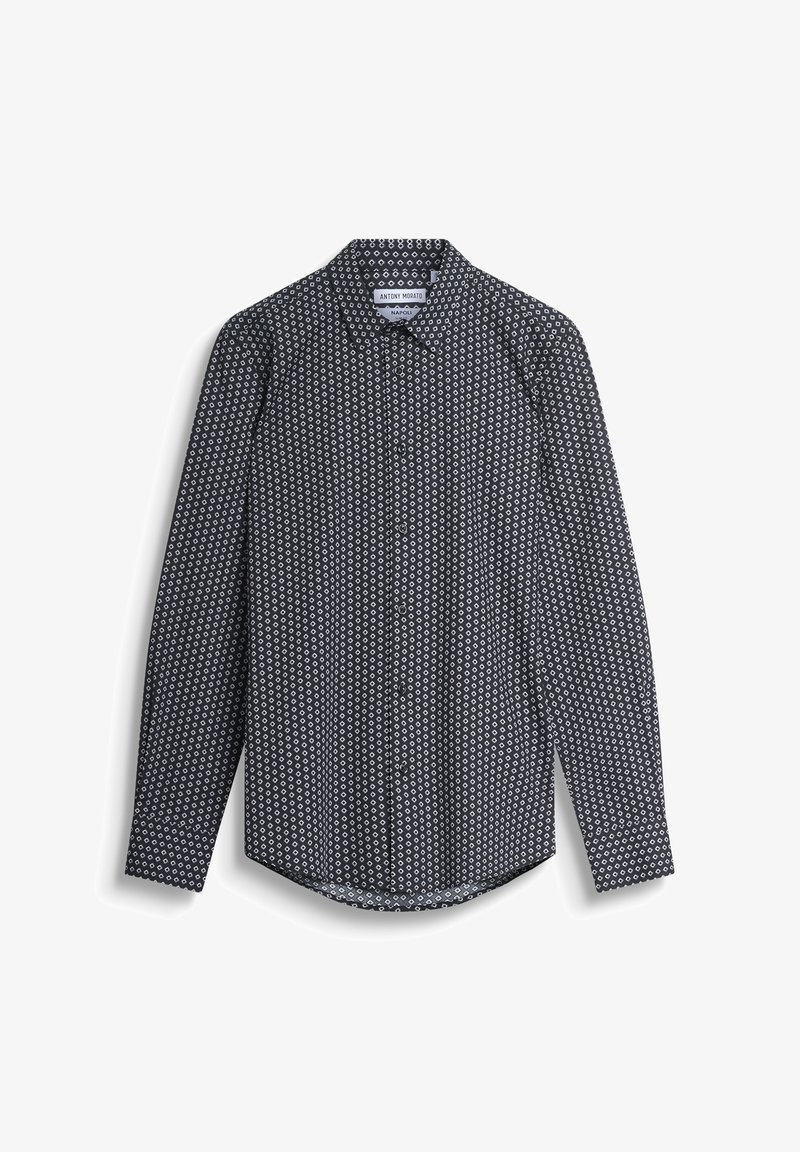 Camisa de manga larga en negro con un patrón circular blanco, cierre de botones en la parte delantera y un cuello clásico. Hecha de tela ligera.