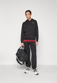 Puma LOUNGEWEAR TRACKSUIT SET - Tracksuit - black