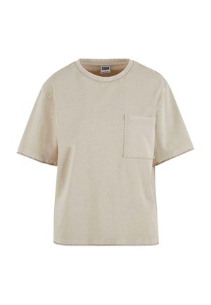 Beige cotton t-shirt with a casual fit, short sleeves, a round neckline, and a chest pocket. Smooth texture with visible stitching.