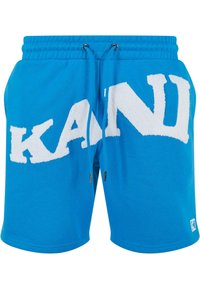 Zila kokvilnas šorti ar lielu baltu frotē auduma logo "KANI". Ar aukliņu regulējama josta un sānu kabatas. Gluda tekstūra ar elastīgu jostu.