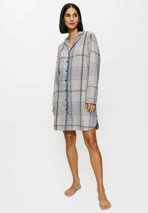 Robe chemise à carreaux beige et bleu, dotée d'un col, d'une fermeture à boutons, de manches longues et de fentes latérales pour le confort. Texture de tissu douce.