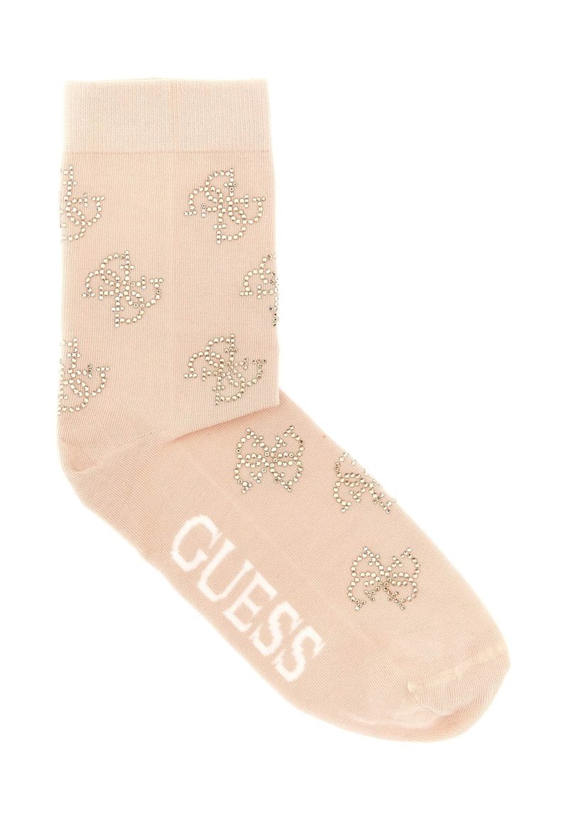 Calza alla caviglia rosa realizzata in materiale morbido, con un motivo a fiocchi glitterati e la parola "GUESS" in bianco all'altezza della caviglia.