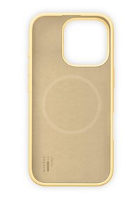Geel telefoonhoesje met een textuur van beige aan de binnenkant, cirkelpatroon en uitsparing voor de camera. Heeft afgeronde hoeken en zijknoppen.