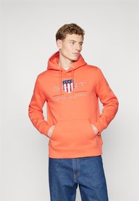 GANT ARCHIVE SHIELD - Mikina s kapucňou - orange