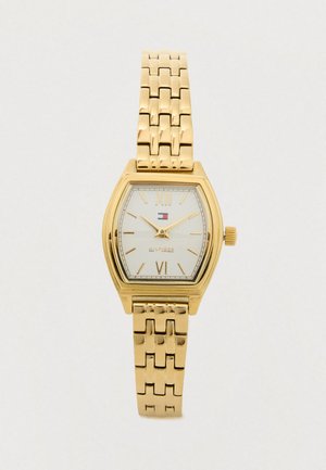 Gold-tone wristwatch with a rectangular white face, Roman numerals XII and VI, gold markers, and a linked metal band.