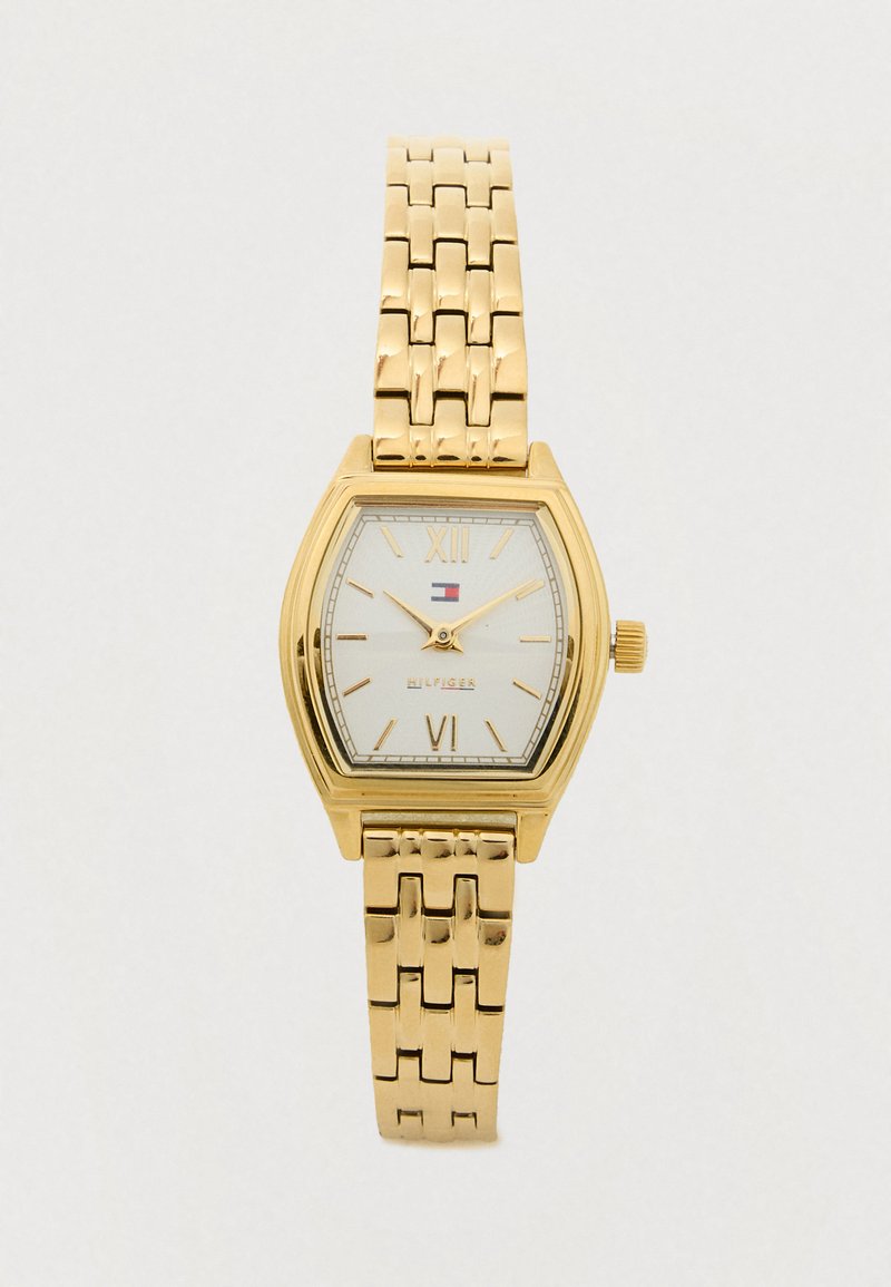 Gold-tone wristwatch with a rectangular white face, Roman numerals XII and VI, gold markers, and a linked metal band.