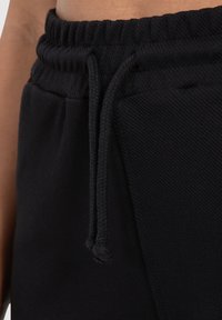 Smilodox FAYNE PRO - Pantaloncini sportivi - schwarz