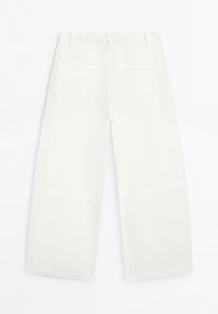 White wide-leg pants shown from the back with belt loops and two horizontal welt pockets.
