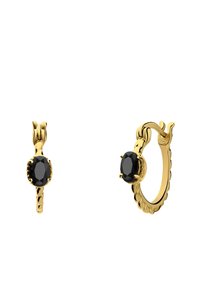 Boucles d'oreilles en or en forme d'anneau avec un design tressé, ornées d'une pierre précieuse ovale noire proéminente au centre.