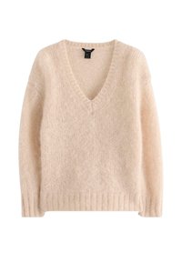 Maglione rosa chiaro a V con maniche lunghe, texture lavorata a maglia e orlo a costine. Materiale morbido con un aspetto leggermente peloso.